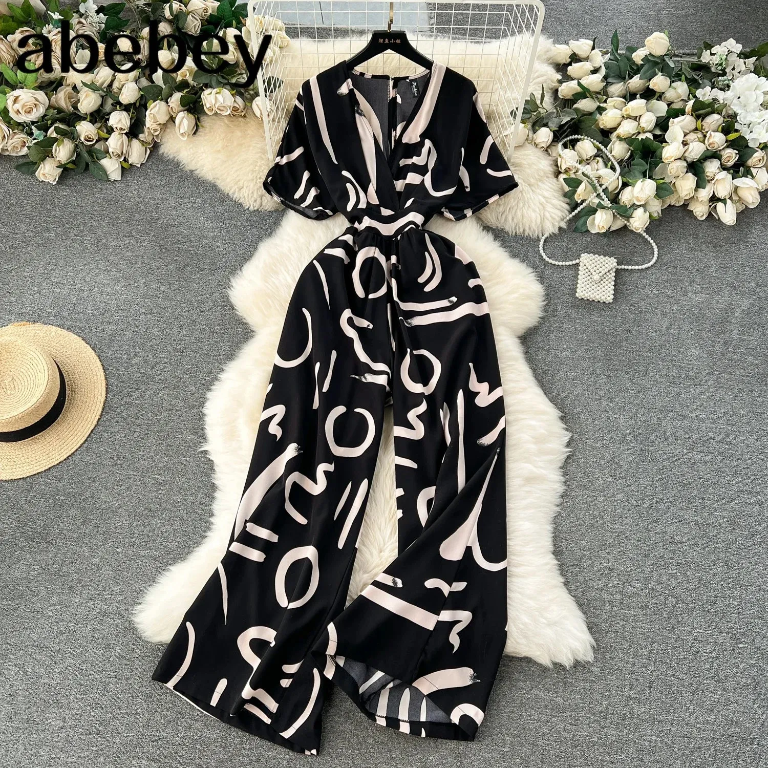 Summer Casual Women Printed Wide Leg Jumpsuit Female V-Neck Short Puff Sleeve High Waist Draped Loose Romper New Fashion