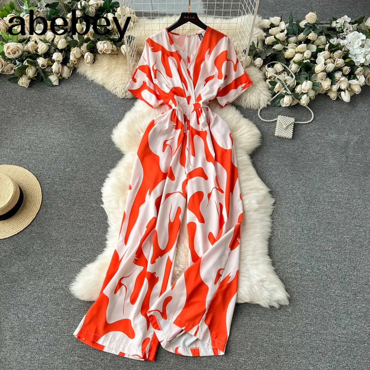 Summer Casual Women Printed Wide Leg Jumpsuit Female V-Neck Short Puff Sleeve High Waist Draped Loose Romper New Fashion